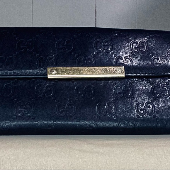 Gucci Handbags - Gucci black leather GG Guccissima logo metal bar plate long wallet